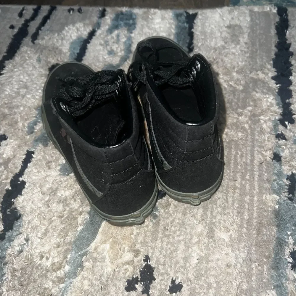 Vans Black High-Top Sneakers with Camo Accent